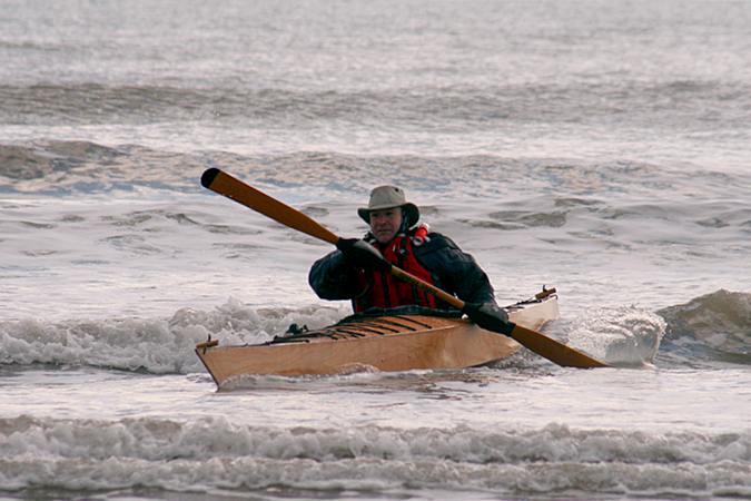 Surfing in a sea kayak