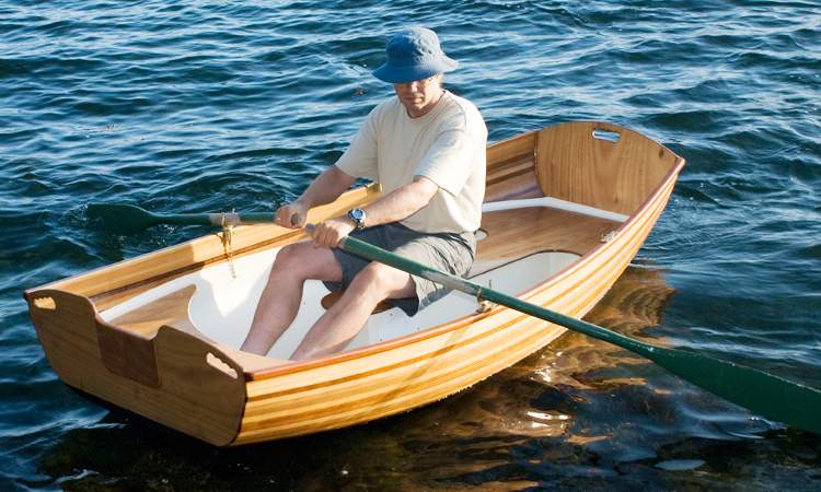 Coot is a cedar-strip rowing pram that makes a handy yacht tender